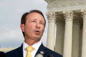In this Sept. 9, 2019, file photo, Louisiana Attorney General Jeff Landry speaks in front of the U.S. Supreme Court in Washington. The Biden administrations suspension of new oil and gas leases on federal land and water was blocked Tuesday, June 15, 2021, by a federal judge in Louisiana. U.S. District Judge Terry Doughtys ruling came in a lawsuit filed in March by Louisianas Republican attorney general, Jeff Landry and officials in 12 other states. Doughtys ruling granting a preliminary injunction to those states said his order applies nationwide. (AP Photo/Manuel Balce Ceneta, File)