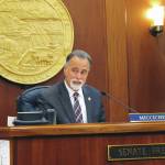 Alaska Senate President Peter Micciche prepares for the start of a brief Senate floor session on Tuesday, June 15, 2021, in Juneau, Alaska. Lawmakers were trying to reach resolution on a state spending package during the special legislative session. (AP Photo/Becky Bohrer)
