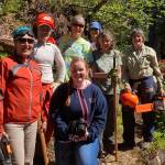 Homer News reporter Sarah Knapp (kneeling) is pictured with the Friends of Kachemak Bay State Park volunteer group who cleared South Eldred Trail during National Trails Day on June 5. The group was able to clear half a mile of the trail. Pictured left to right are Kristine Moerlein, Amy Holman, Kathy Sarns, Lyn Maslow, Ruth Dickerson and Kris Holderied. (Photo by Michael Singer)