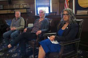 Alaska House Speaker Louise Stutes, center, along with leaders of the House majority coalition, Rep. Bryce Edgmon, left and Rep. Kelly Merrickspeaks, right, speak to reporters on the final day of a special legislative session in Juneau, Alaska Friday, June 18, 2021. The special legislative session limped toward a bitter end Friday, with Alaska Gov. Mike Dunleavy and House majority leaders sharply disagreeing over the adequacy of the budget passed by lawmakers earlier this week. (AP Photo/Becky Bohrer)