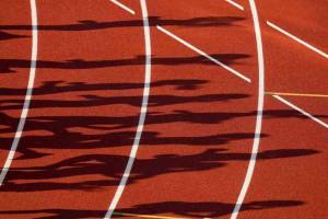 Runners in the first prelim of the women's 3000-meter steeplechase cast shadows at the U.S. Olympic Track and Field Trials on Sunday, June 20, 2021, in Eugene, Ore., at the U.S. Olympic Track and Field Trials. (AP Photo/Charlie Riedel)