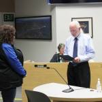 Soldotna Mayor Paul Whitney (right) presents Soldotna Chamber of Commerce Executive Director Shanon Davis with a proclamation on Wednesday, June 23, 2021 in Soldotna, Alaska. (Ashlyn OHara/Peninsula Clarion)