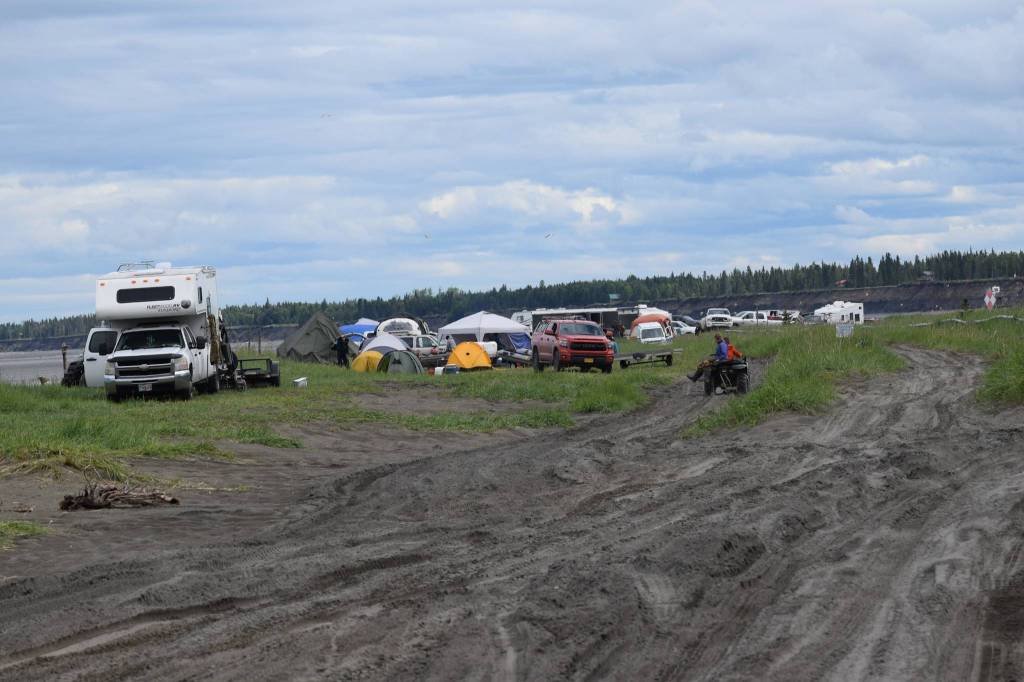 Campers are set up at the Kasilof River State Recreational Site in Kasilof, Alaska, on Friday, June 25, 2021. The Kasilof River dipnet opening yields anglers from all over the state. (Camille Botello/Peninsula Clarion)