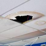 A ceiling panel damaged by water inside a classroom at Seward High School, pictured in May 2021, is the result of a warranty issue that the Kenai Peninsula Borough School District maintenance team said it is working to resolve. (Young Kim for The Hechinger Report)