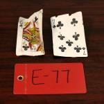 Two playing cards recovered from the 1952 crash of a C-124 Globemaster were found this month on Colony Glacier and displayed at Joint Base Elmendorf-Richardson, Alaska, Tuesday, Sept. 29, 2021. (AP Photo/Mark Thiessen)