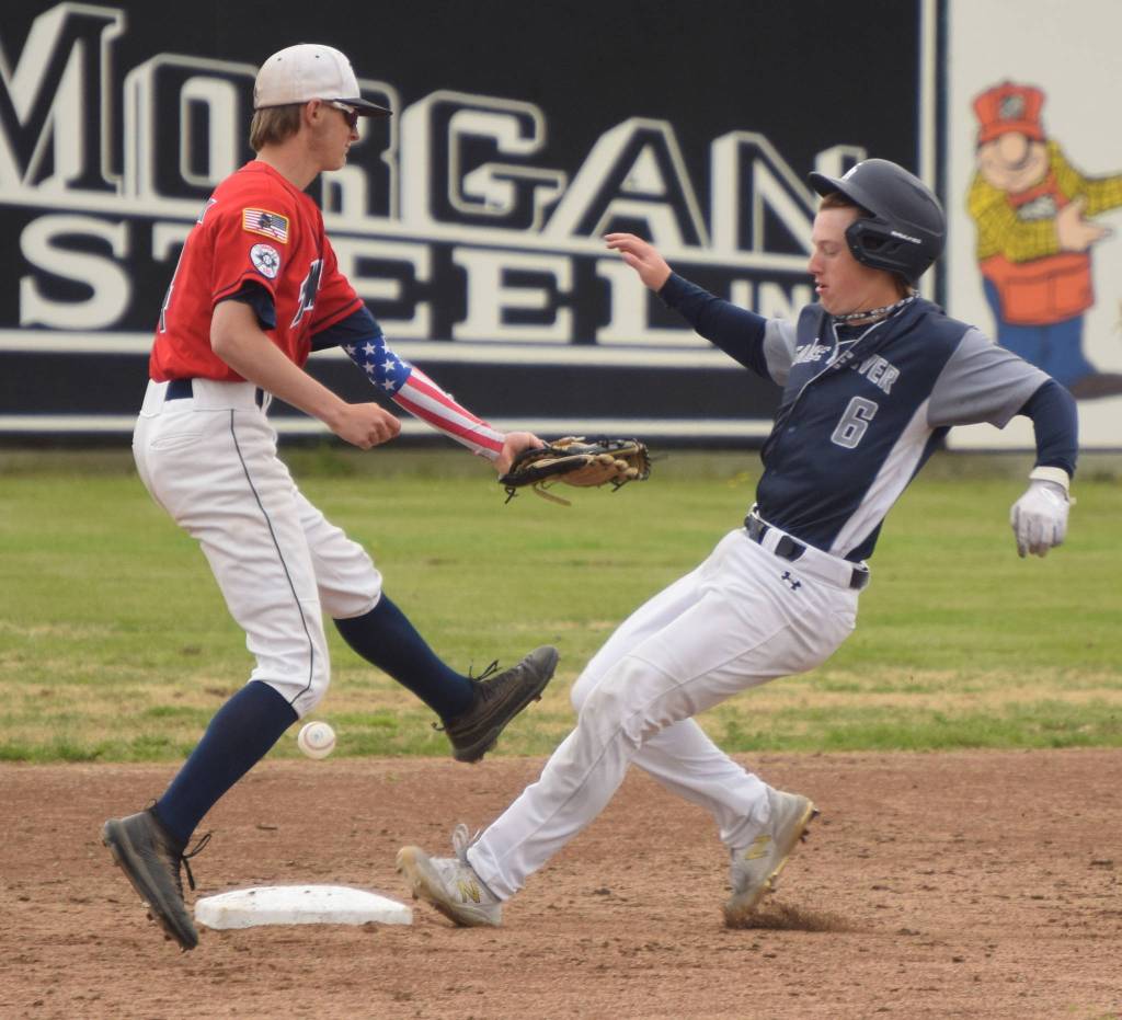 Eagle Rivers Cam Witte reaches second base safely against Twins second baseman Daltyn Deborski on Saturday, July 3, 2021, at Coral Seymour Memorial Park in Kenai, Alaska. (Photo by Jeff Helminiak/Peninsula Clarion)