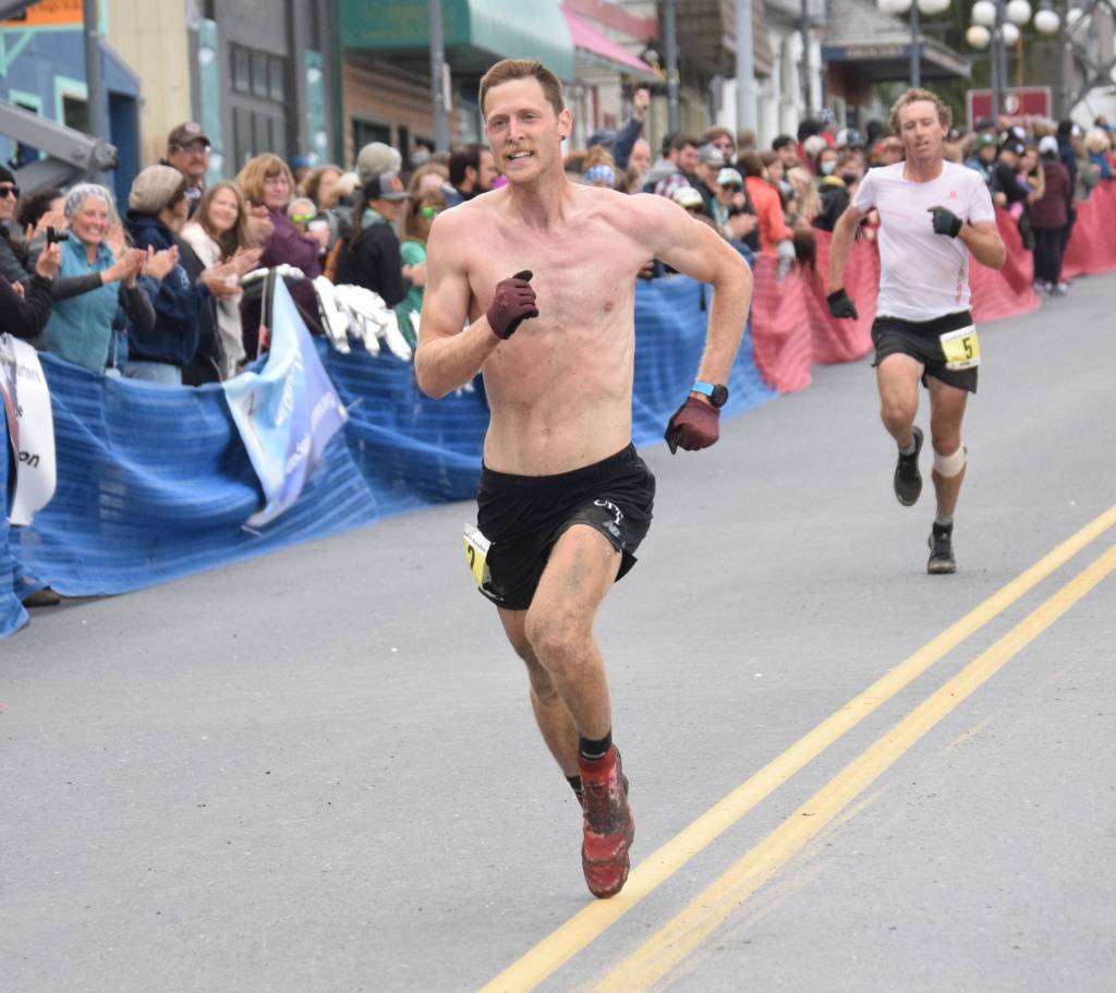 Anchorages Lars Arneson outsprints Dakota Jones of Bozeman, Montana, for sixth place in the mens Mount Marathon Race on Wednesday, July 7, 2021, in Seward, Alaska. (Photo by Jeff Helminiak/Peninsula Clarion)
