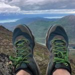 Camille Botello reaches the Skyline summit near Cooper Landing, Alaska with dirty ankles on June 27, 2021. (Camille Botello / Peninsula Clarion)