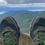 Camille Botello reaches the Skyline summit near Cooper Landing, Alaska with dirty ankles on June 27, 2021. (Camille Botello / Peninsula Clarion)