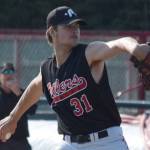 Oilers starting pitcher Luke Yacinich delivers home during the team's home game against the Chugiak Chinooks at Coral Seymour Memorial Park in Kenai, Alaska, on Wednesday, July 14, 2021. (Camille Botello / Peninsula Clarion)