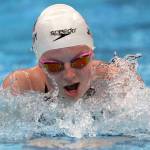 Lydia Jacoby of the United States swims in a heat during the women's 100-meter breaststroke at the 2020 Summer Olympics, Sunday, July 25, 2021, in Tokyo, Japan. (AP Photo/Matthias Schrader)