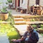 Kathy Matta polishes her lacquer fish in China in this undated photo. (Photo provided by Kathy Matta)