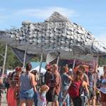 A giant silver salmon is paraded through Salmonfest on Saturday, Aug. 3, 2019 in Ninilchik, Alaska. (Photo by Megan Pacer/Homer News)