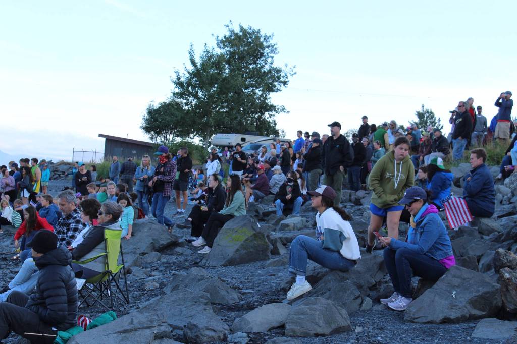 A crowd watches Lydia Jacoby from shore on Thursday, Aug. 5, 2021 in Seward, Alaska. (Ashlyn OHara/Peninsula Clarion)