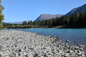 Anglers gather along the banks of the Kenai River near Sportsmans Landing in Cooper Landing in September 2018. (Peninsula Clarion file)