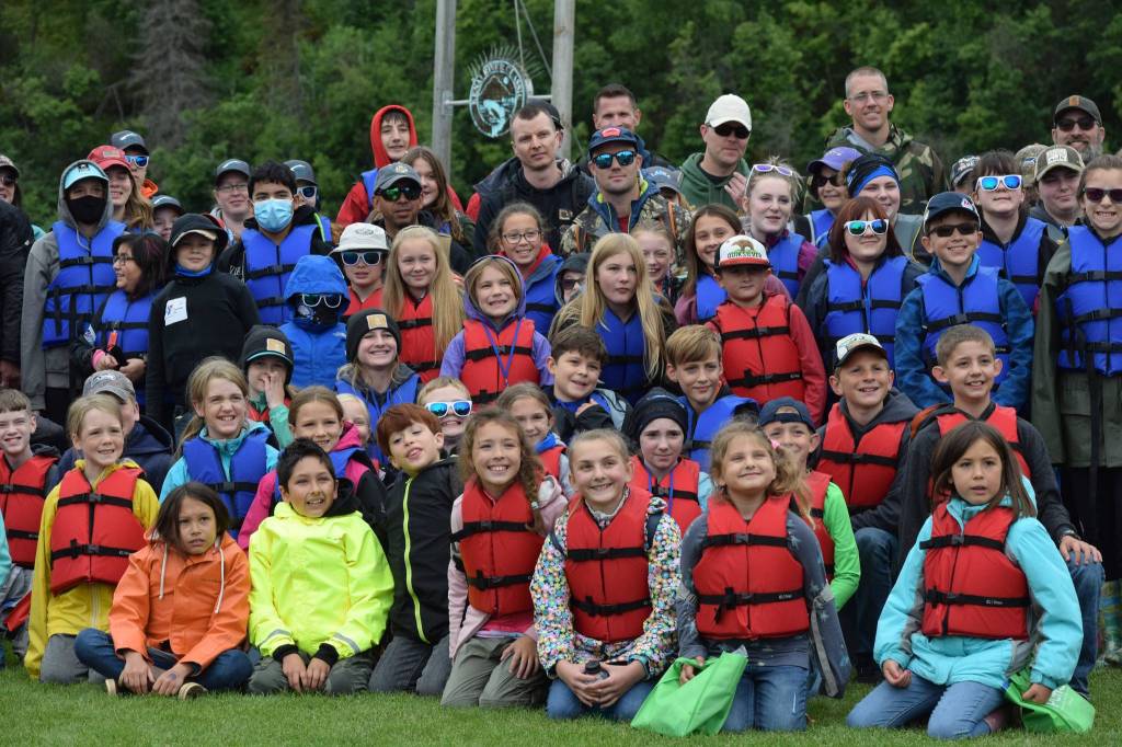 Participants in the Kenai River Junior Classic prepare to launch from Harry Gaines Fish Camp in Soldotna on Wednesday, Aug. 11, 2021. (Camille Botello/Peninsula Clarion)