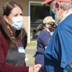 Alaska Chief Medical Officer Anne Zink, M.D., left, meets Homer Mayor Ken Castner, right, at a meet-and-greet on Thursday, May 27, 2021, at the Homer Public Health Center in Homer, Alaska. (Photo by Sarah Knapp/Homer News)