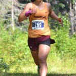 Dimonds Emily Erickson runs to victory in the girls varsity race at the Ted McKenney XC Invitational on Saturday, Aug. 21, 2021, at Tsalteshi Trails just outside of Soldotna, Alaska. (Photo by Jeff Helminiak/Peninsula Clarion)