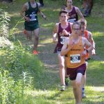 Dimonds Jared Gardiner takes the lead for good in the boys varsity race at the Ted McKenney XC Invitational on Saturday, Aug. 21, 2021, at Tsalteshi Trails just outside of Soldotna, Alaska. (Photo by Jeff Helminiak/Peninsula Clarion)