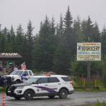 Alaska State Troopers investigate a shooting scene on Monday, Aug. 23, 2021, at the Anchor Point Warehouse in Anchor Point, Alaska at the store on the Sterling Highway in which an Alaska State Trooper was shot. Troopers were searching for the alleged shooter, Bret Herrick, 60. (Photo by Michael Armstrong/Homer News)
