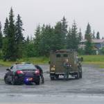 Alaska State Troopers and members of the Special Emergency Reaction Team respond at a shooting scene on Monday, Aug. 23, 2021, at the Anchor Point Warehouse in Anchor Point, Alaska, on the Sterling Highway. An Alaska State Trooper was shot and is in fair condition at an Anchorage hospital. Troopers arrested the suspect, Bret Herrick, 60, on Tuesday morning, Aug. 24, 2021. (Photo by Michael Armstrong/Homer News)