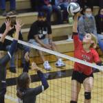 Kenai Centrals Cali Holmes attacks Soldotna in the final of the Shayna Pritchard Memorial Volleyball Tournament on Saturday at Nikiski High School in Nikiski. (Photo by Jeff Helminiak/Peninsula Clarion)