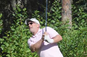 Birch Ridge pro Rich Lundahl tees off on the 18th hole Sunday, Aug. 29, 2021, during the final round of the Kenai Peninsula Open at Birch Ridge Golf Course in Soldotna, Alaska. (Photo by Jeff Helminiak/Peninsula Clarion)
