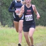 Soldotnas Jordan Strausbaugh tries to find a way around Kenai Centrals Jayna Boonstra on Wednesday, Sept. 1, 2021, at the Kenai-Soldotna dual meet at Tsalteshi Trails just outside of Soldotna, Alaska. Boonstra was able to hang on for first place in the race. (Photo by Jeff Helminiak/Peninsula Clarion)
