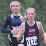Soldotna's Jordan Strausbaugh tries to find a way around Kenai Central's Jayna Boonstra on Wednesday, Sept. 1, 2021, at the Kenai-Soldotna dual meet at Tsalteshi Trails just outside of Soldotna, Alaska. Boonstra was able to hang on for first place in the race. (Photo by Jeff Helminiak/Peninsula Clarion)