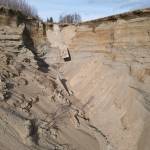 A bluff near Bryson Avenue erodes following failure of a rusty pipe. (Photo courtesy of the City of Kenai)