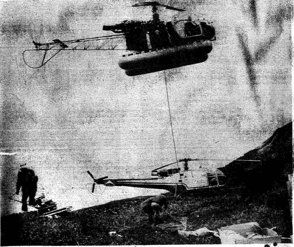 Helicopters lift bodies from the crash site of an Alaska Airlines Boeing 727 that flew into a mountain near Juneau in 1971, killing all 111 aboard. (Associated Press)