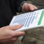 Capt. Kevin Hadden holds a dive chart during a training exercise in Juneau with a Coast Guard dive team on Sept. 6, 2021. (Courtesy photo / MyKenzie Robertson)