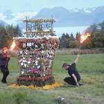 Mavis Muller, left, and Matt Steffy, right, light on fire Reimagine, the 17th annual Burning Basket, in a field on Sunday, Sept. 13, 2020, near Homer, Alaska. Artist and coordinator Muller intended to broadcast live on Facebook and YouTube the burning of the basket, but because of technical difficulties that didnt happen. Burning Basket teaches how to let go of expectations and accept the present moment, Muller wrote in a text message. Technology is fickle. The basket, however, did exactly what it promised to do. It helod our collective burderns, our memorials, our joys, sadness, fear, and dispersed all of our good intentions in a plume of smoke, sparks and flames. (Photo by Michael Armstrong/Homer News)
