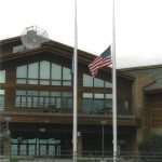 Flags fly at half-staff in front of Homer High School on Sept. 11, 2001, in memory of the victims of the attacks in New York, Washington, D.C., and in the air over Pennsylvania. (Homer News file photo)