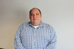 Dan Nelson stands in the Peninsula Clarion building on Tuesday, Aug. 31, 2021 in Kenai, Alaska. (Ashlyn OHara/Peninsula Clarion)