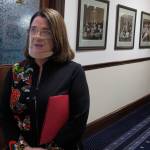 In this March 15, 2021, file photo, Alaska state Sen. Lora Reinbold, an Eagle River Republican, speaks to reporters in Juneau, Alaska. The Alaska state lawmaker has requested an excusal from the state Senate until mid-January, citing the challenges of traveling to Juneau after she was suspended from flying on Alaska Airlines earlier this year. (AP Photo/Becky Bohrer, Pool, File)