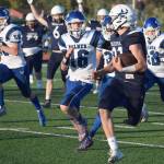 Brayden Taylor runs the ball to the end zone during Soldotna Highs homecoming footall game at Justin Maile Field in Soldotna, Alaska on Friday, Sept. 10, 2021. (Camille Botello/Peninsula Clarion)