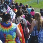 A group spanning the length of five blocks marches in downtown Soldotna, Alaska, to celebrate Pride Month on Saturday, June 12, 2021. (Camille Botello/Peninsula Clarion)