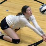 Nikiskis Jaycee Tauriainen digs up a ball from Soldotna on Tuesday, Sept. 14, 2021, at Nikiski Middle-High School in Nikiski, Alaska. (Photo by Jeff Helminiak/Peninsula Clarion)