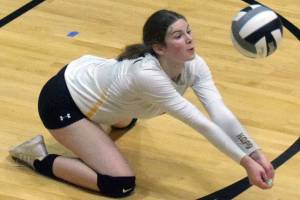 Nikiski's Jaycee Tauriainen digs up a ball from Soldotna on Tuesday, Sept. 14, 2021, at Nikiski Middle-High School in Nikiski, Alaska. (Photo by Jeff Helminiak/Peninsula Clarion)
