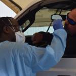 Medical Assistant Louis Hubbard administers a COVID-19 test to Rick Dealba on Friday, Sept. 17, 2021 at Capstone Clinic in Kenai. (Camille Botello/Peninsula Clarion)