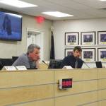 Kenai Peninsula Borough Assembly members Richard Derkevorkian (left) and Jesse Bjorkman (right) participate in the assemblys Tuesday, Feb. 16, 2021 meeting at the borough assembly chambers in Soldotna, Alaska. The assembly voted Tuesday to fund 13 new positions for four fire and EMS service areas. (Photo by Ashlyn OHara/Peninsula Clarion)