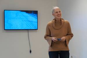Sheryl Maree Reily speaks last Friday, Sept. 17, 2021, about the Homer Drawdown Peatland exhibit showing at the Pratt Museum & Park in Homer, Alaska. Reily was a Bunnell Street Arts Center Artist in Residence who did an installation and video for the exhbit. (Photo by Michael Armstrong/Homer News)