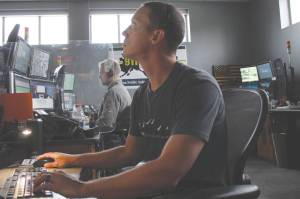 Ryan Tunks works at the Kenai Peninsula Borough Office of Emergency Management on Thursday, Sept. 23, 2021 in Soldotna, Alaska. (Ashlyn OՈara/Peninsula Clarion)