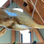 A wood-carved whale hangs in the Nikiski Senior Center on Sept. 23, 2021. (Photo courtesy of the Nikiski Senior Center)