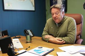 KPEDD Executive Director Tim Dillon sits in his office on Thursday, Sept. 30, 2021 north of Kenai, Alaska. (Ashlyn O’Hara/Peninsula Clarion)