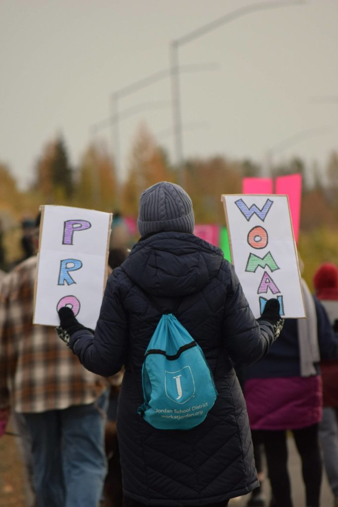 Demonstrators march through Soldotna as part of the national Womens March Rally for Abortion Justice on Saturday, Oct. 2, 2021. (Camille Botello/Peninsula Clarion)