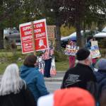 Anti-abortion counterprotestors gather in downtown Soldotna during the national Womens March Rally for Abortion Justice on Saturday, Oct. 2, 2021. (Camille Botello/Peninsula Clarion)