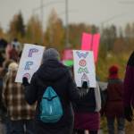 Demonstrators march through Soldotna as part of the national Womens March Rally for Abortion Justice on Saturday, Oct. 2, 2021. (Camille Botello/Peninsula Clarion)