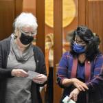 Peter Segall / Juneau Empire
Speaker of the Alaska House of Representatives Louise Stutes, R-Kodiak, and House Minority Leader Cathy Tilton, R-Wasilla, step outside the House chambers on Monday to discuss a message from the Senate. Lawmakers entered their fourth special session Monday, with a resolution to hold committee meetings remotely.